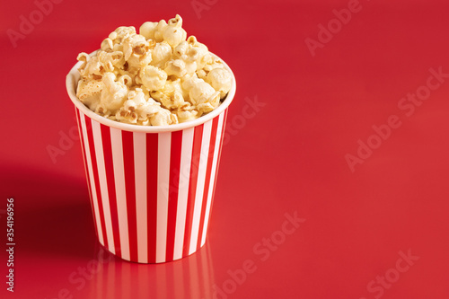 popcorn blast cinema box with corn bucket on red isolated