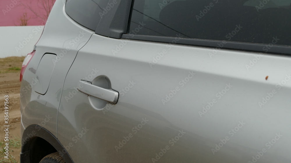 door handle of the car on the passenger side