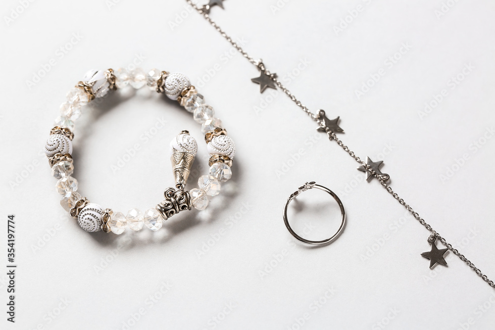 Beautiful jewelry on light background Beautiful jewelry on light background