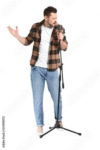 Handsome man singing agains...