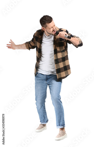 Handsome man singing agains...