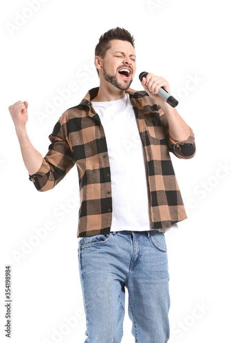 Handsome man singing agains...