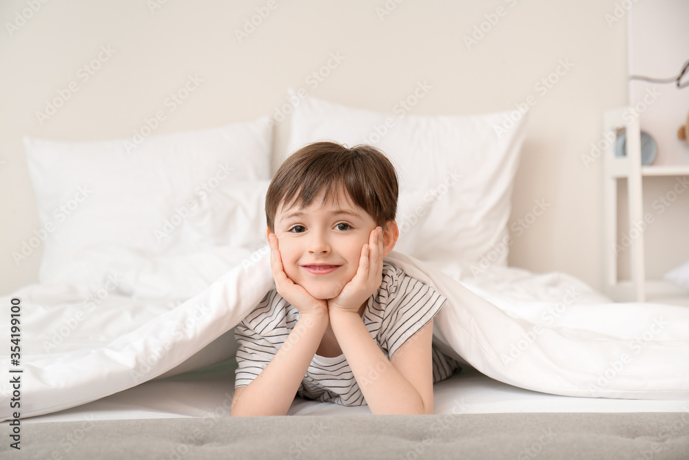 Morning of little boy in bedroom Morning of little boy in bedroom