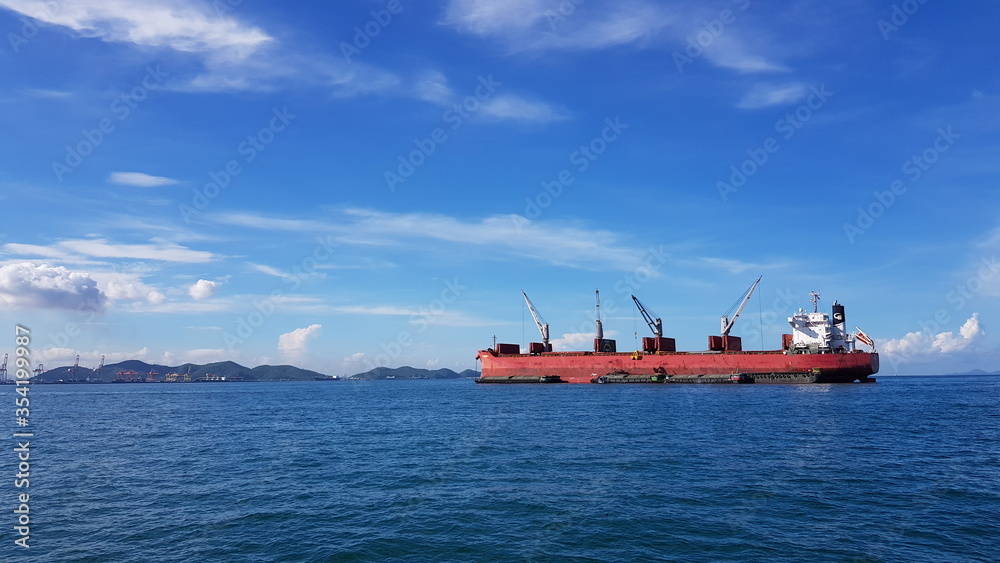 Fototapeta premium red ship in the sea