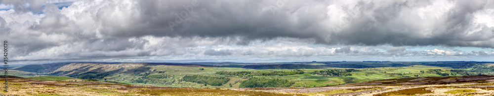 Obraz premium Panorama of cloudy sky and the hills of the Yorkshire Dales, United Kingdom 