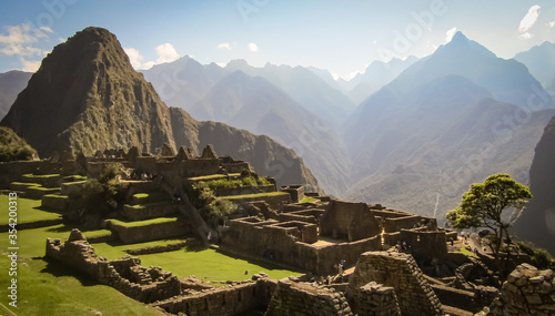 Panoramic view of a sunset in Machu Picchu, Peru, ancient Inca city.