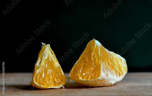 Peeled Tangerine on Black Background