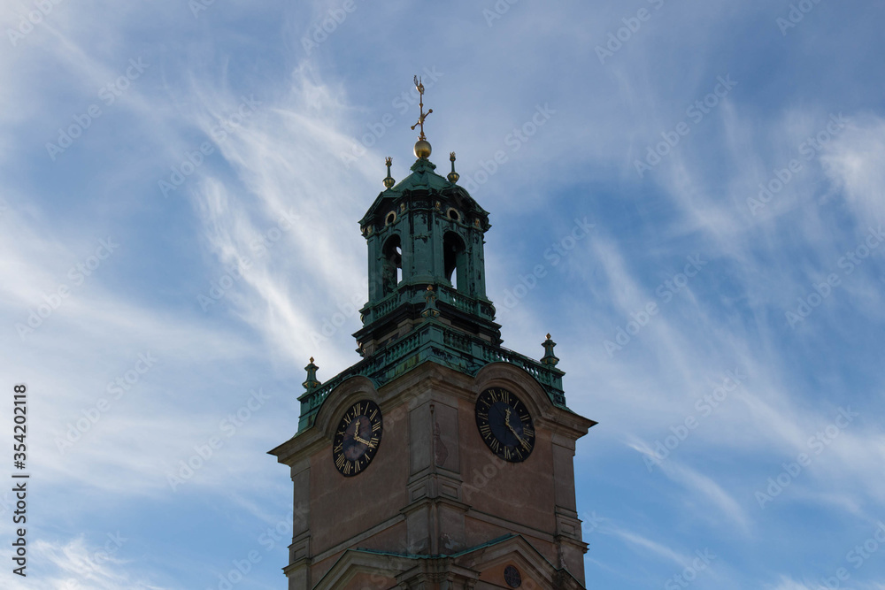 Close up view of the tower of Saint Nicholas Church or Storkyrkan, Stockholm, Sweden.