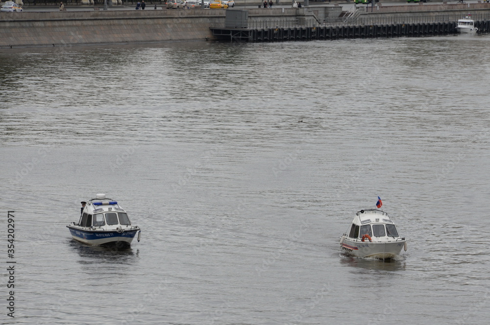 Boats of the water police and rescue service at the water bodies of the Russian Emergencies Ministry on the Moscow River Boats of the water police and rescue service at the water bodies of the Russian Emergencies Ministry on the Moscow River
