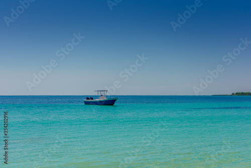 The boat in the Caribbean Sea on a sunny day.