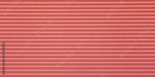 pink colored steel roller shutter door texture background