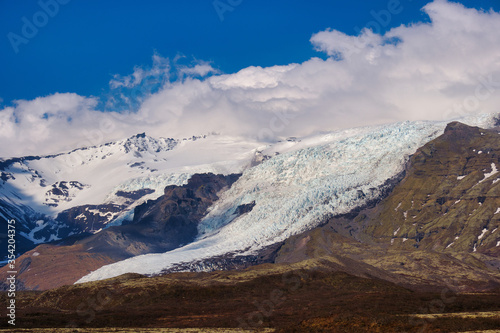 Beautiful blue iced glaciers retreating back into the mountains on the south east of Iceland