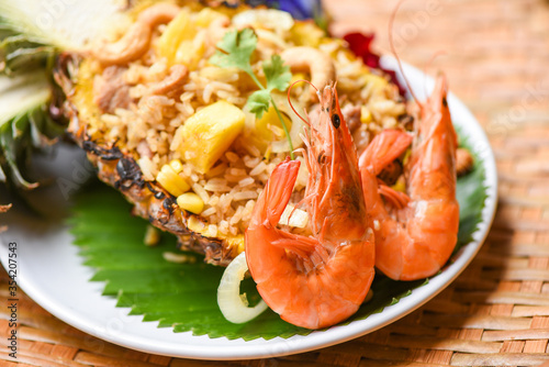 fried rice shrimp and fruits pineapple on plate asian food in thai - delicious menu shrimps prawns cooked