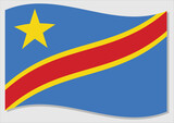 Waving flag of DRC vector graphic. Waving Congolese flag illustration. DRC country flag wavin in the wind is a symbol of freedom and independence.