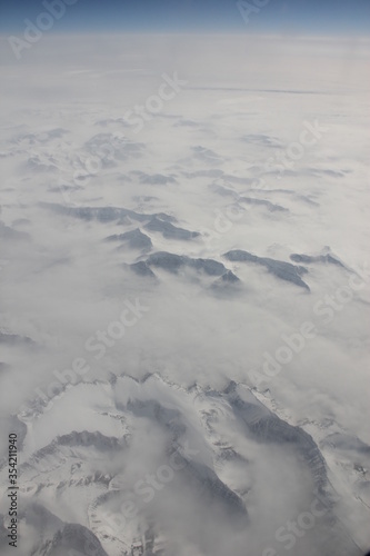aerial view of the snow covered mountains