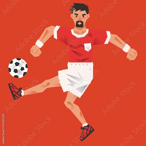 Man kicking football