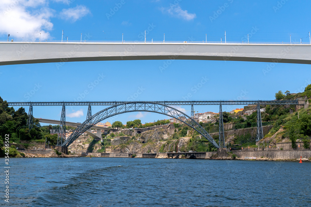 Obraz premium Porto, Oporto , water view with bridges. Old city, architecture, cityscape. City tour 7 bridges