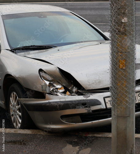 Fototapeta Naklejka Na Ścianę i Meble -  gray car after the accident