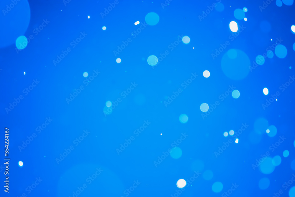 Blue glitter bokeh of light.Abstract blurred light