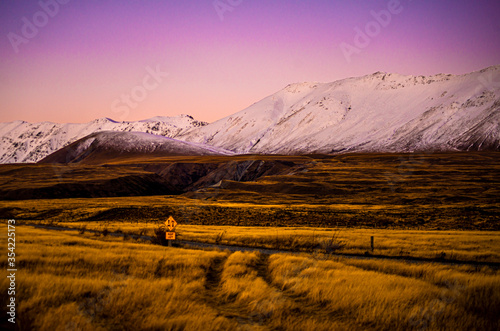 Foto Sunset at lake tekapo shore