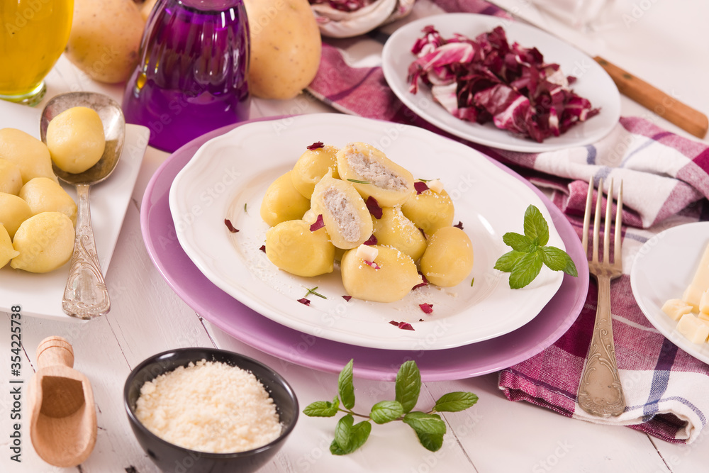 Potato gnocchi stuffed with radicchio and ricotta.
Potato gnocchi stuffed with radicchio and ricotta.