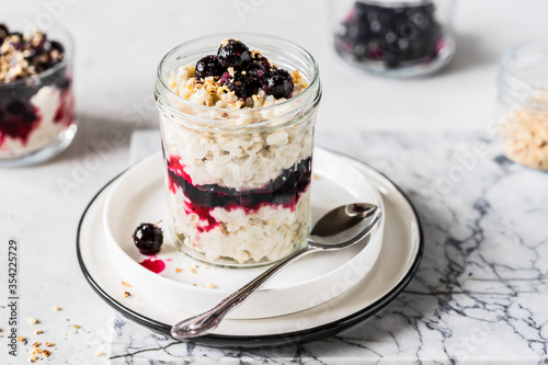 Oat Porridge in a Jar with Blackcurrant photo