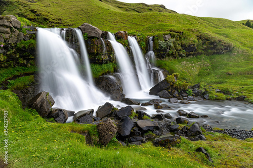 Waterfalls and beautiful streams at Gluggafoss in the Icelandic countryside In the summer  there are grass and wildflowers all over the area. Take long-exposure pictures Beautiful soft water.