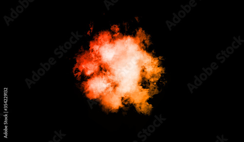 Explosion of red, orange and yellow on black background. © Sergey Fedoskin