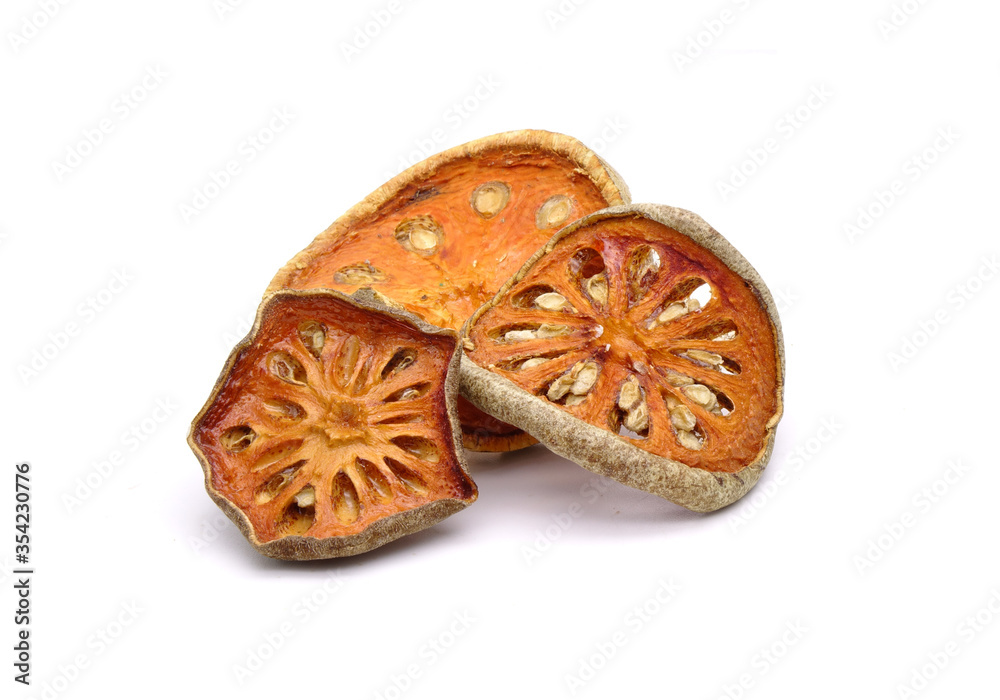 Dried sliced Bael fruit isolated on white background. Bael fruit has