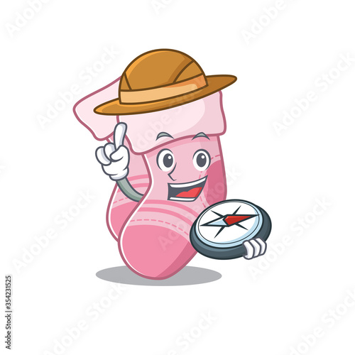 mascot design concept of baby socks explorer using a compass in the forest