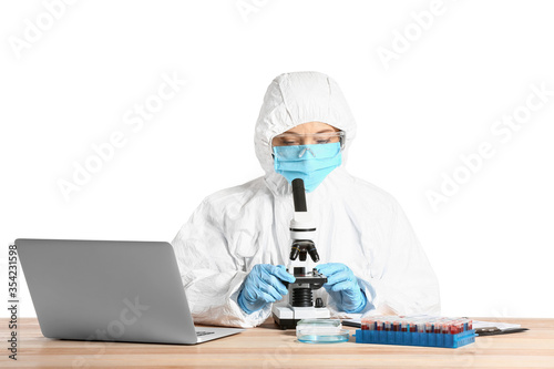 Scientist working with micr...