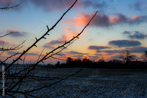 Sunset over frozen field