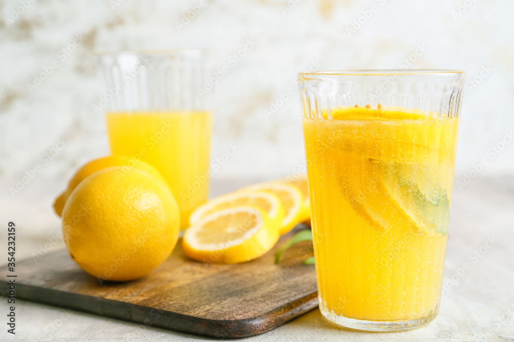 Composition with fresh lemonade on table Composition with fresh lemonade on table