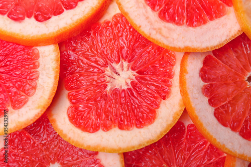 Fresh cut grapefruit as background