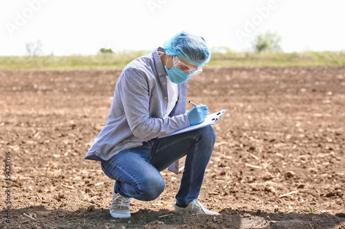 Scientist studying samples ...