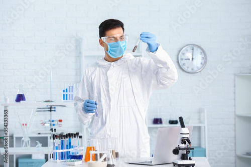 Scientist studying samples ...