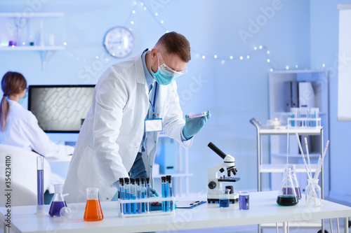 Scientist working with samp...