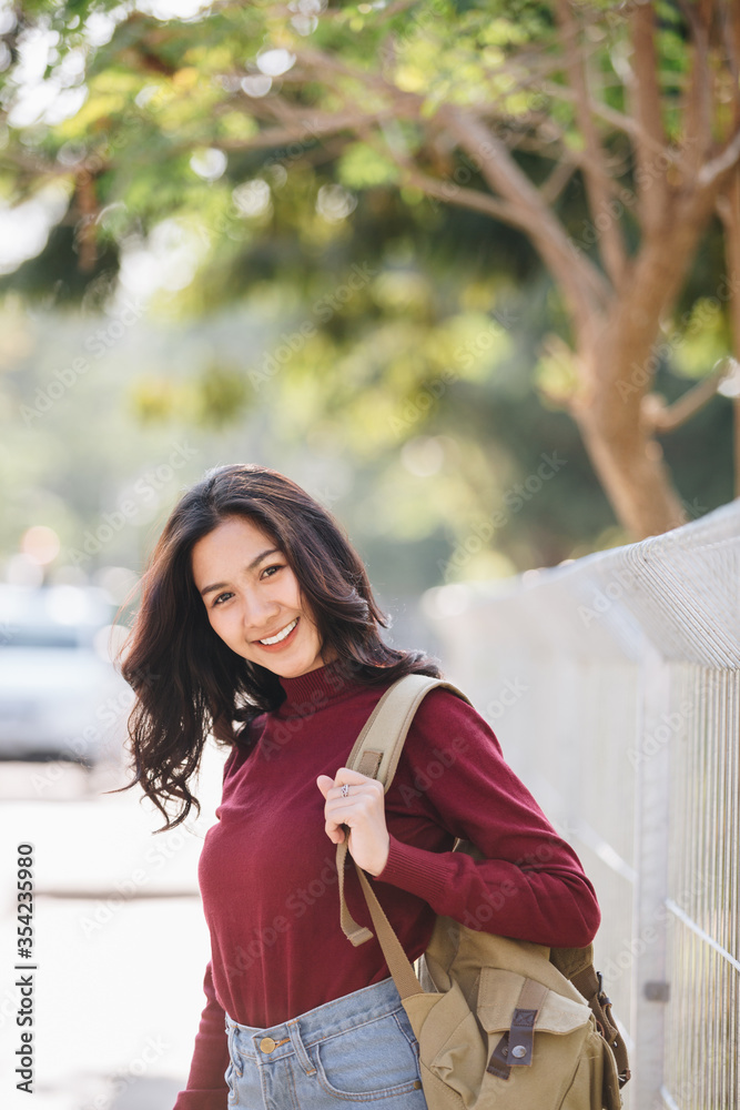 Fototapeta premium Happy woman student with backpack,Education concept