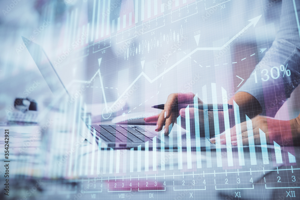 Double exposure of woman hands typing on computer and forex chart hologram drawing. Stock market invest concept. Double exposure of woman hands typing on computer and forex chart hologram drawing. Stock market invest concept.