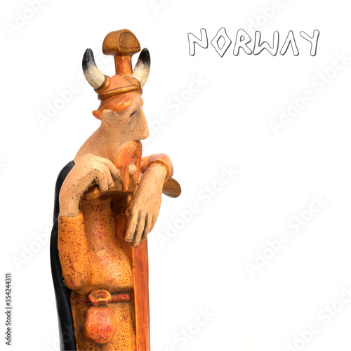 Tourist souvenir from Norway  Old Viking with a sword  isolated on white background