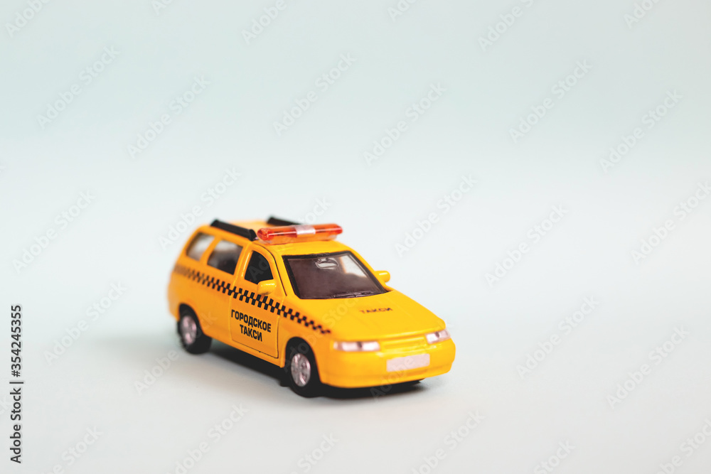 Yellow taxi car model. idea, symbol, concept of urban service and delivery. Mobile online application concept. Yellow taxi car model. idea, symbol, concept of urban service and delivery. Mobile online application concept.