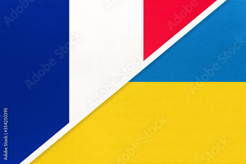 France and Ukraine  symbol of two national flags from textile. Championship between two european countries.
