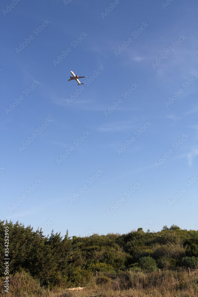 Beautiful scenery and airplane takeoff from the airport. Mallorca, Spain. Balearic Islands Beautiful scenery and airplane takeoff from the airport. Mallorca, Spain. Balearic Islands