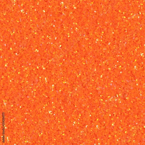 Elegant orange, red glitter, sparkle confetti texture. Christmas abstract background, seamless pattern.