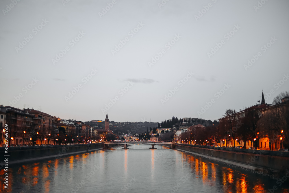 Fototapeta premium night, city, river, prague, architecture, water, castle, bridge, europe, cityscape, travel, sky, sunset, building, view, old, evening, town, skyline, budapest, reflection, tourism, czech, landmark, ca