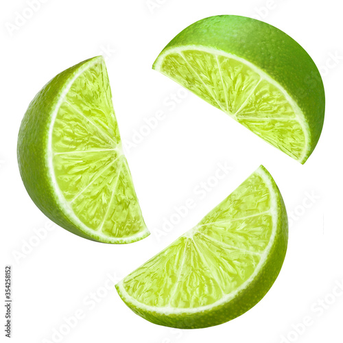 Canvas Print Flying fresh lime slices, isolated on white background