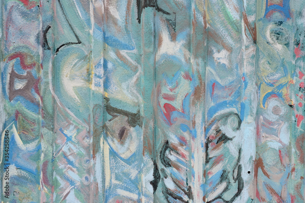 Colorful brush strokes on the texture of the old metal Colorful brush strokes on the texture of the old metal