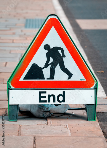 End of Road Works sign next to a Cycle lane