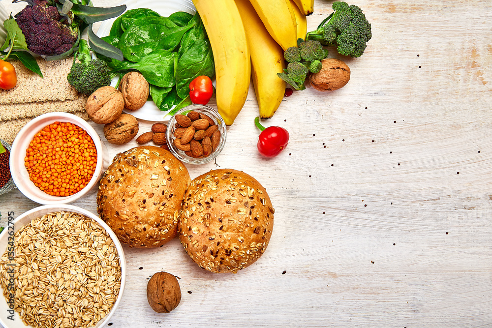 High Fiber Foods on white wooden background, Healthy balanced dieting concept. Top view, flat lay, copy space. High Fiber Foods on white wooden background, Healthy balanced dieting concept. Top view, flat lay, copy space.