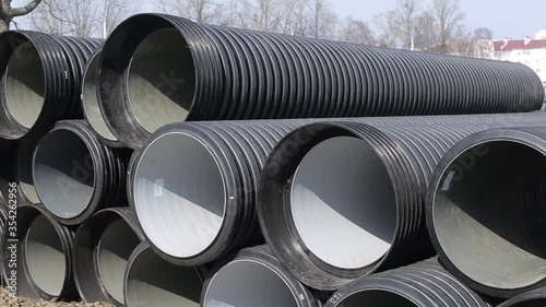 Modern polypropylene pipes for conducting heating mains underground. Durable and anticorrosive properties of water pipes, drainage system photo